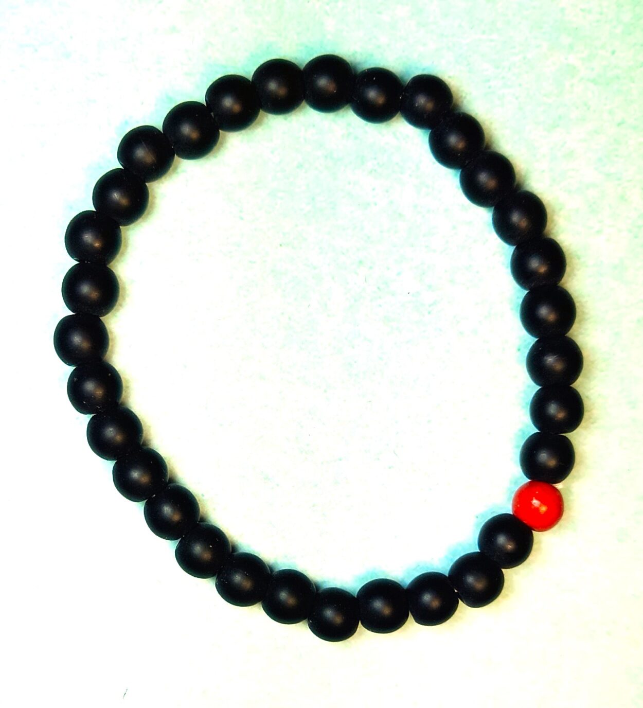 Black & 1 Red Bead Bracelet - Image 2