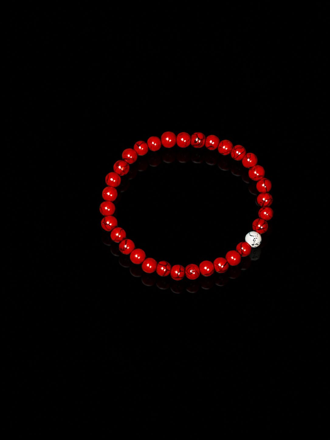 Red Bead with Single White Bead Bracelet - Image 2